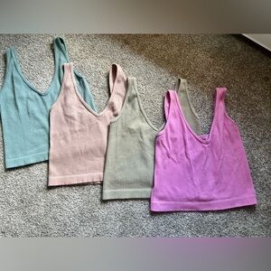 Set of 4 tanks size large fit like a medium